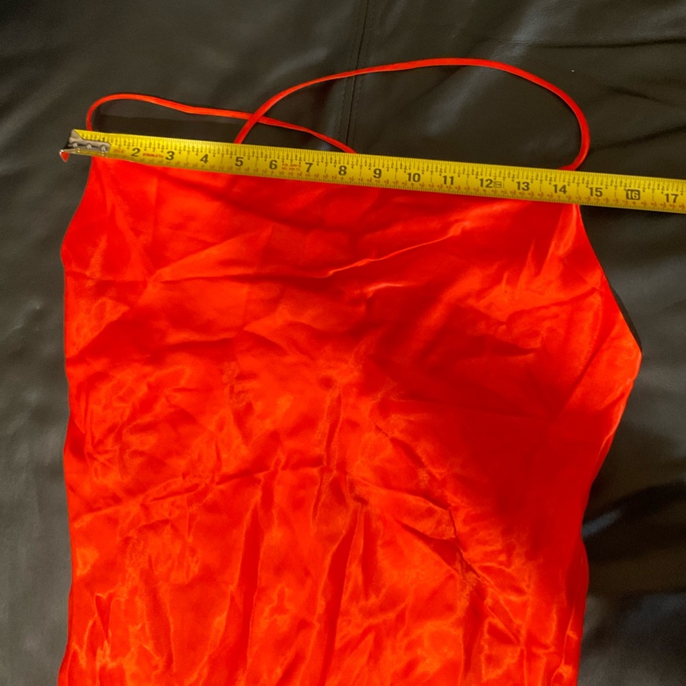 SHORT SATIN EFFECT DRESS
Zara - Picture 12 of 16